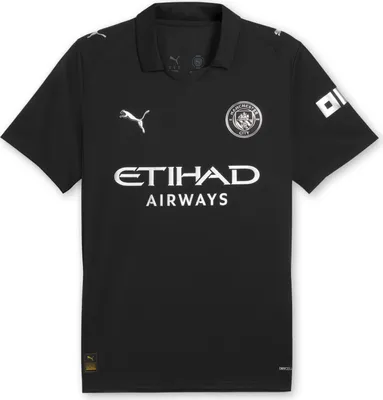 A black Puma Manchester City football jersey is displayed flat against a white background.