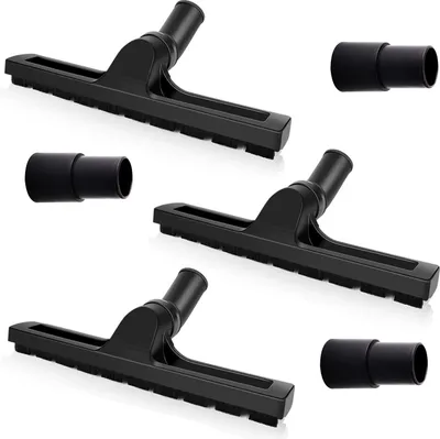Three vacuum cleaner floor brushes and two adapters arranged on a white background.