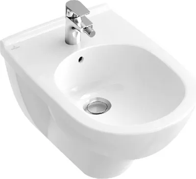 A white ceramic bidet with a chrome faucet, shown from a slightly elevated angle against a white background.