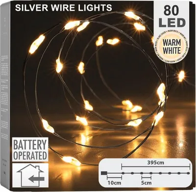 The image shows the packaging of silver wire lights with warm white LEDs.