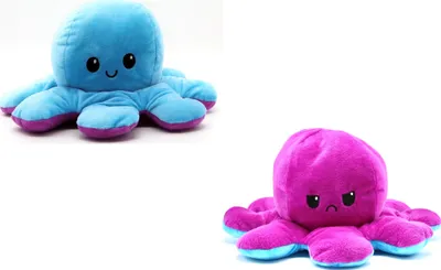 Two reversible plush octopus toys are shown against a white background. One is blue and purple, showing a happy face. The other is pink and blue, showing a sad face.