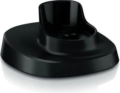 A black charging stand for a hair clipper.