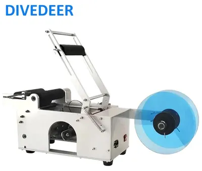Produktbild von Tisch Etikettiermaschine - Halbautomatisch für runde Glasflaschen - Selbstklebende Etiketten 12-150mm - 10-30 Stk/min - 220V