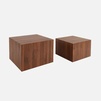 Two cube-shaped coffee tables with a wood-like finish.