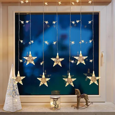 Produktbild von LED Lichtvorhang "Sterne" 3,6W 1m x 1,2m Warmweiß