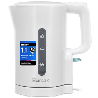 A white electric kettle is shown from the front-left.