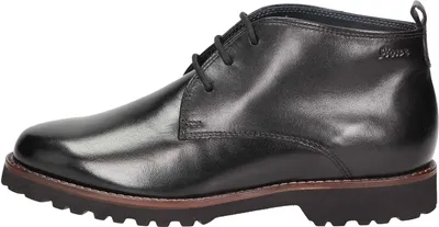 Side view of a black leather chukka boot.