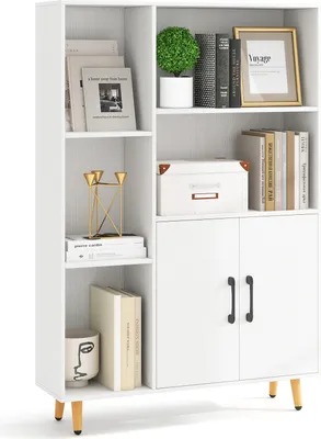A white bookshelf with various items on its shelves, including books, a plant, and decorative objects.