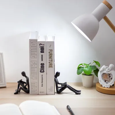 Produktbild von Dekorative Buchstützen aus Gusseisen für schwere Bücher