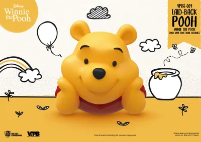 Obrázok produktu pre Winnie The Pooh Malá vinylová pokladnička ležiaci Winnie 17 cm