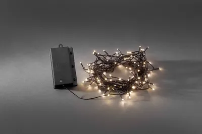 Produktbild von Konstsmide - LED Lichterkette, mit an/aus Schalter Lichtsensor und 6h und 9h Timer, 240 warm weiße Dioden, batteriebetrieben, Außen (IP44), schwarzes Kabel 4 x D 1.5V (exkl.); 3730-100