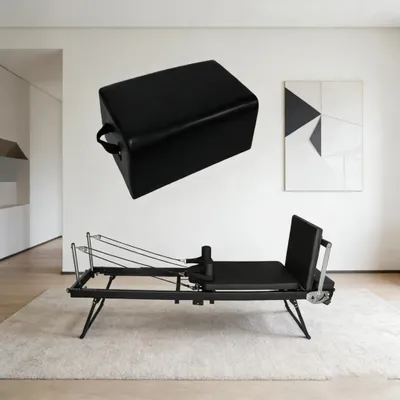 Produktbild von Pilates Reformer - Heimtrainer - Klappbar - Verstellbarer Federwiderstand - Stahl/Edelstahl-Rahmen - Inkl. Pedal & Box - Schwarz