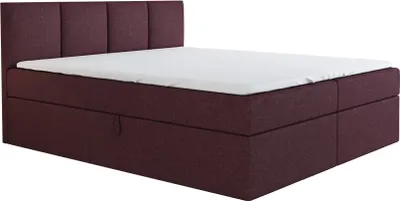 A boxspring bed with a violet upholstered base and headboard, and a white mattress and topper.