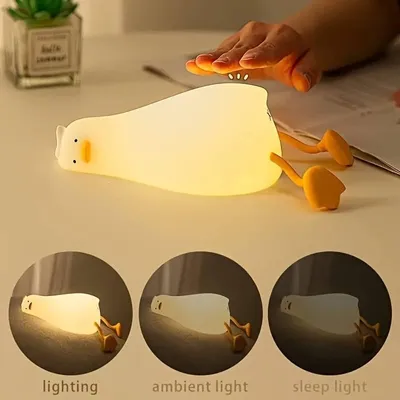 Produktbild von Suesse Ente Nachtlicht Warmweisses Nachtlicht mit Beruehrungssensor 3 Lichthelligkeit Weiches Silikon Tier Nachtlampe Handyhalter Nachtbegleiter