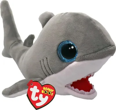 A stuffed toy shark with large blue glittery eyes and an open mouth showing teeth and red interior.