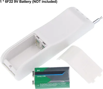 A white remote control with its battery compartment open, showing a 9V battery and the battery cover removed.