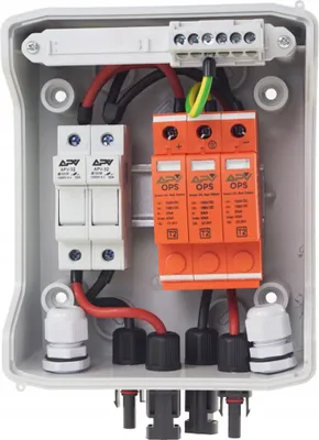 An open electrical junction box containing various components for a solar power system.