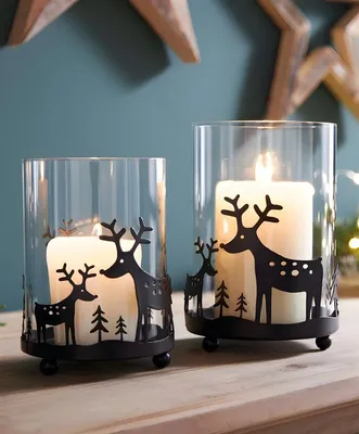 Produktbild von 2x Windlicht "Rentiere" aus Metall, schwarz & Glas, 11 + 13 cm hoch, Kerzenhalter für Stumpenkerzen, Teelichtglas, Windlichtglas