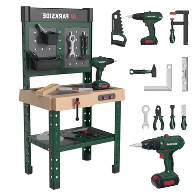 A toy workbench with various tools and accessories displayed around it.