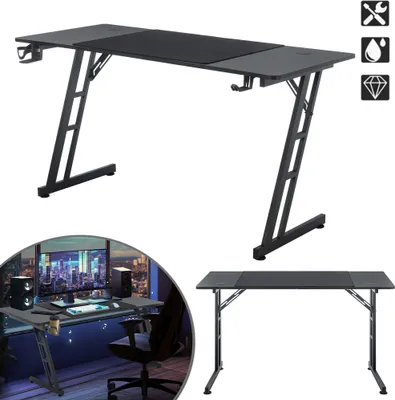 A gaming desk is shown in two different configurations and settings. The top image shows the desk from a front-diagonal angle against a white background. The bottom left image shows the desk set up in a room with a city view at night, featuring a computer 