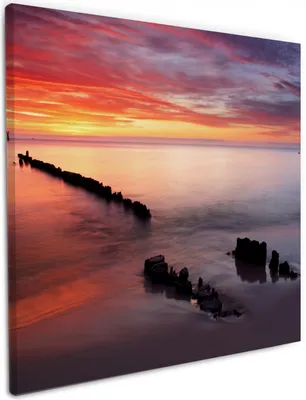 Produktbild von Wallario Premium Leinwandbild Sandstrand im Sonnenuntergang - Roter Himmel in Größe 50 x 50 cm