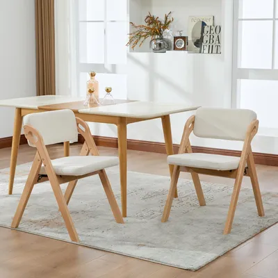 Produktbild von Set of 2 Klappstühle aus Buchenholz mit gepolsterten Sitzen in Beige, stapelbar