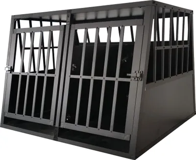 A black metal dog crate with two compartments.