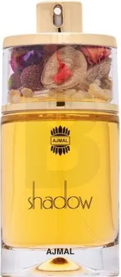 A perfume bottle with dried flowers in the cap.