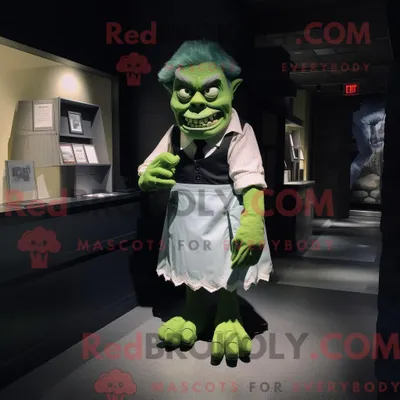 Obrázok produktu pre Maskot spoločnosti REDBROKOLY je zelené monštrum pripomínajúce Frankenšteina, oblečené do sukne tvaru písmena A a s vreckovkami
