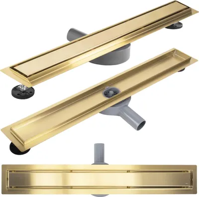 Three views of a gold linear shower drain with a gray drain body.