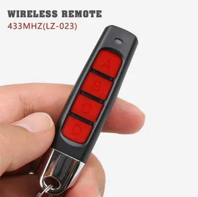 Zdjęcie produktu dla Uniwersalny pilot 433 MHz do bram garażowych, przeznaczony do użytku domowego i komercyjnego - kolor: szary - otwieracz z funkcją klonowania i duplikacji - kompatybilny z systemami alarmowymi samochodowymi - nadaje się do bram i rolet