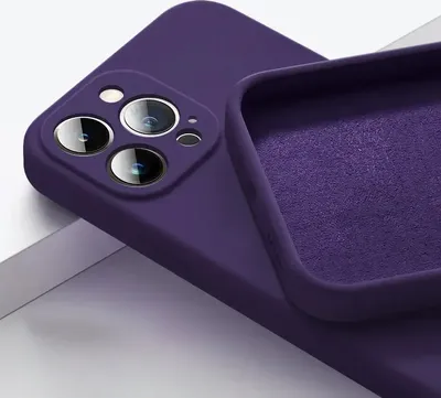 Close-up of a dark purple iPhone case, showing the camera cutout and the interior lining.