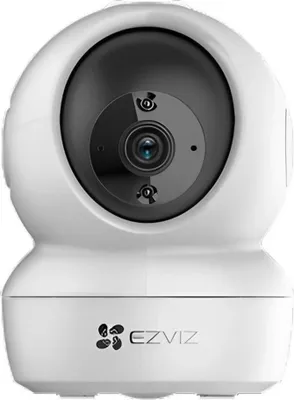 A white security camera with a black lens.