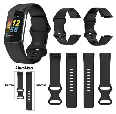 A collection of black watch bands and a smartwatch.