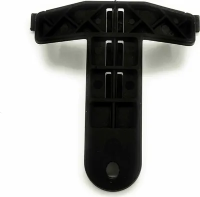 A black plastic T-connector piece on a white background.