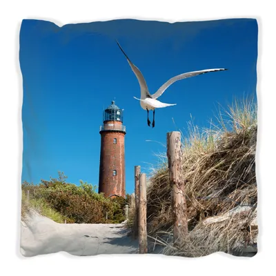 Produktbild von Wallario Premium Kissen, weiche Oberfläche, mit Motiv Möwe am Strand mit Leuchtturm, Größe: 40 x 40 cm, mit weißer Rückseite