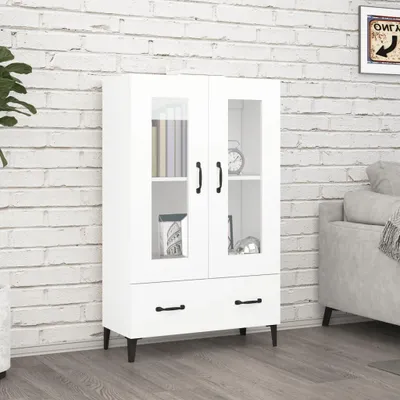 A white cabinet with glass doors and drawers is shown against a white brick wall.