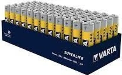 A display box filled with Varta AAA batteries.