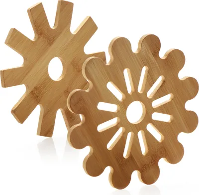 Productafbeelding van com-four® 4-delige set bamboe panonderzetters - Onderleggers voor pannen, braadpannen, ovenschalen en borden - Set panonderzetters - Hittebestendige onderzetters van bamboe