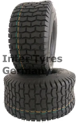 Two tires are stacked on a white background.