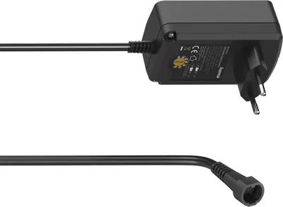 A black universal adjustable power supply with a European plug and a detachable cable.
