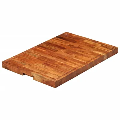 A wooden cutting board is shown from a slightly elevated angle against a white background.