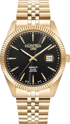 A close-up studio shot of a gold Roamer watch with a black dial.