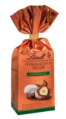Zdjęcie produktu dla Świąteczne orzechy Lindt z karmelizowanymi orzechami laskowymi i cynamonem 100g