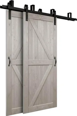 Two sliding barn doors with black hardware against a white background.