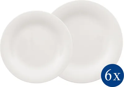 Two white plates are shown, one slightly overlapping the other. A blue circle with '6x' in white text is in the bottom right corner.