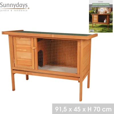 A wooden rabbit hutch with a green roof, shown from a front-side angle.