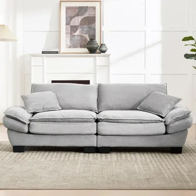 Image de Un canapé double moderne et simple, avec un matelas à ressorts, un seul coussin, confortable mais spacieux, idéal pour le salon, la chambre ou le bureau, de couleur gris clair