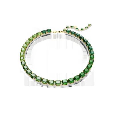 A necklace with green gemstones on a white background.