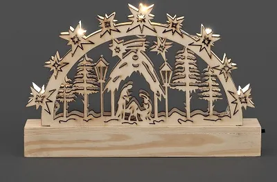 A wooden Christmas nativity scene silhouette with LED lights.
